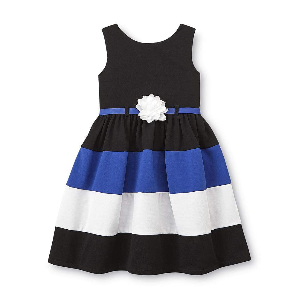 Vestido a rayas con flor en cintura