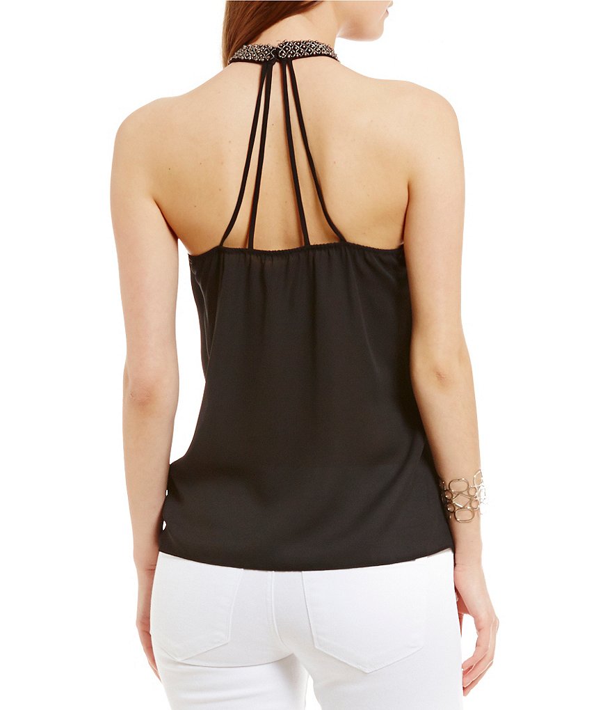 Musculosa con escote bordado y detalle en espalda