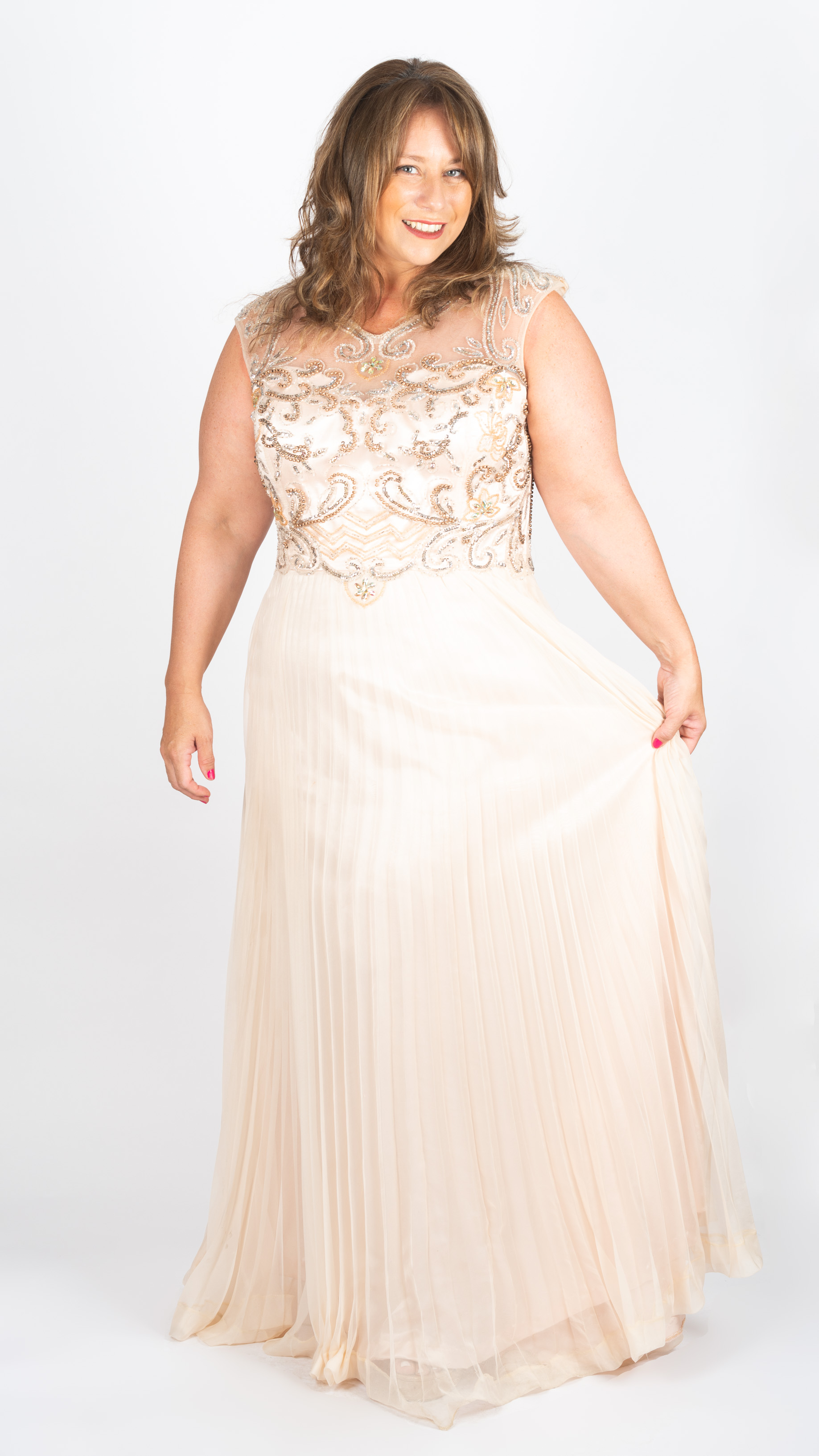 Vestido con top bordado y falda plisada