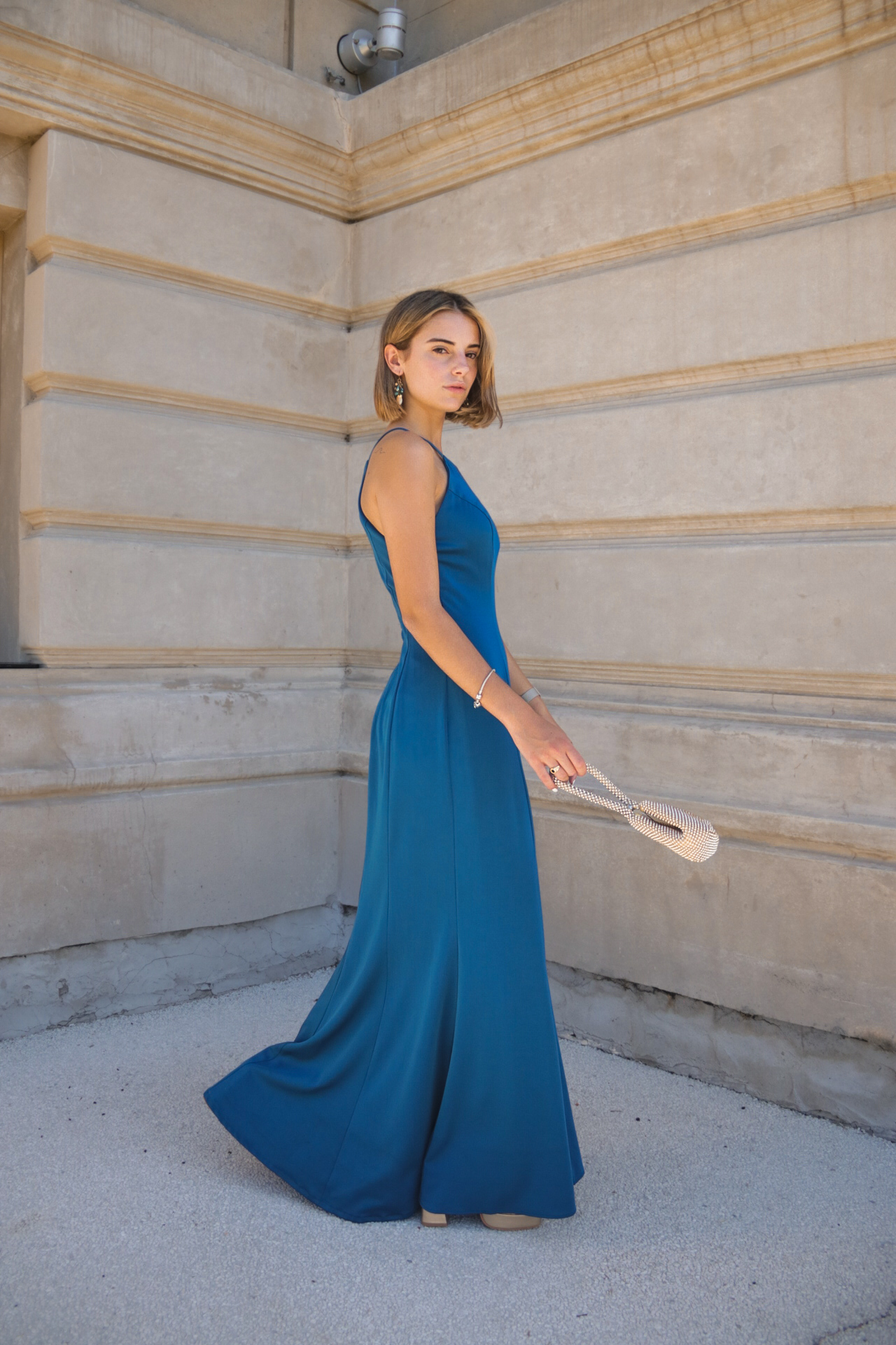 Vestido petroleo con detalles en costados