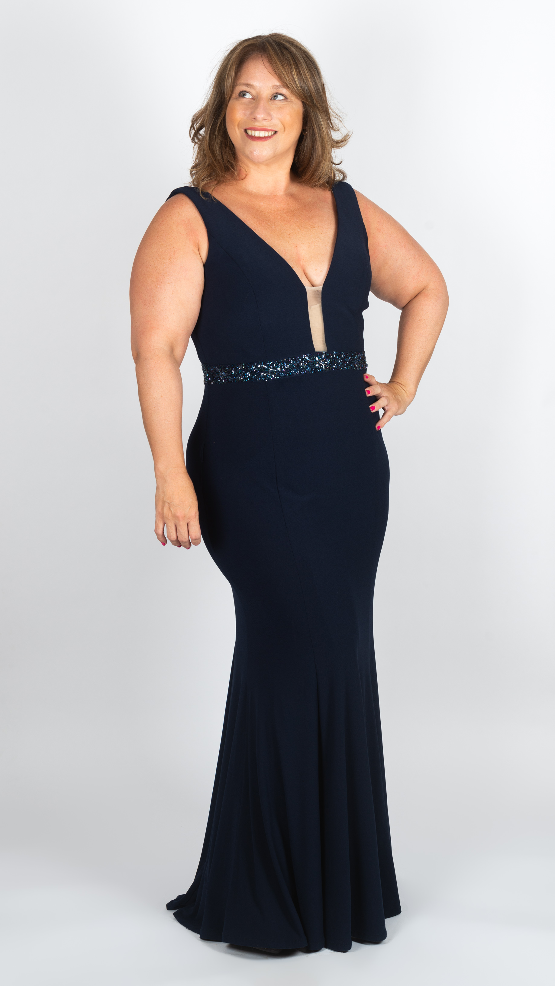 Vestido azul con bordado en cintura y espalda escotada