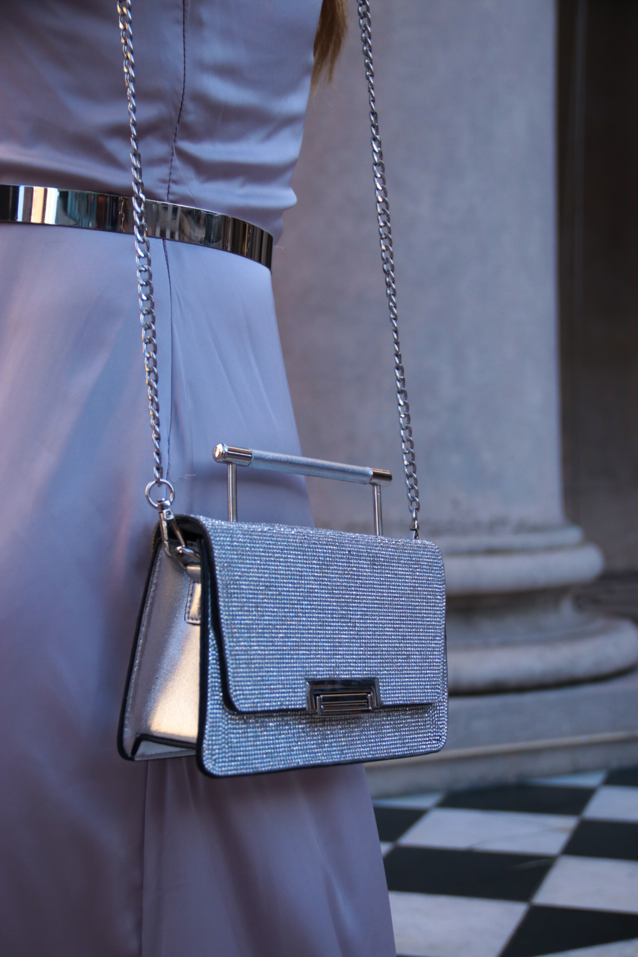 Cartera con strass en tapa