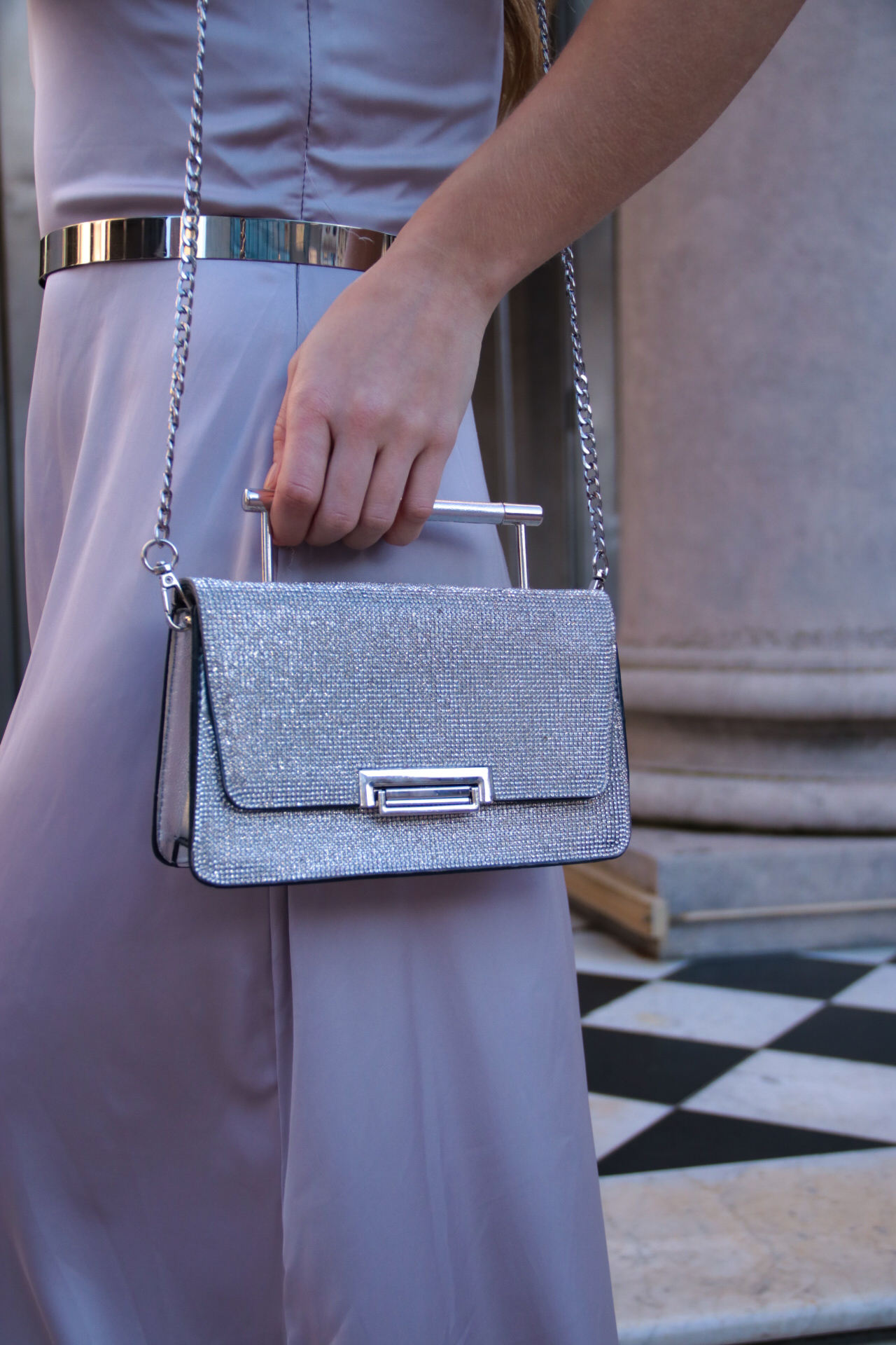 Cartera con strass en tapa